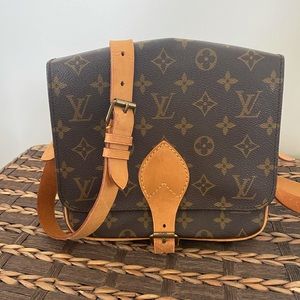 Authentic Louis Vuitton sling purse